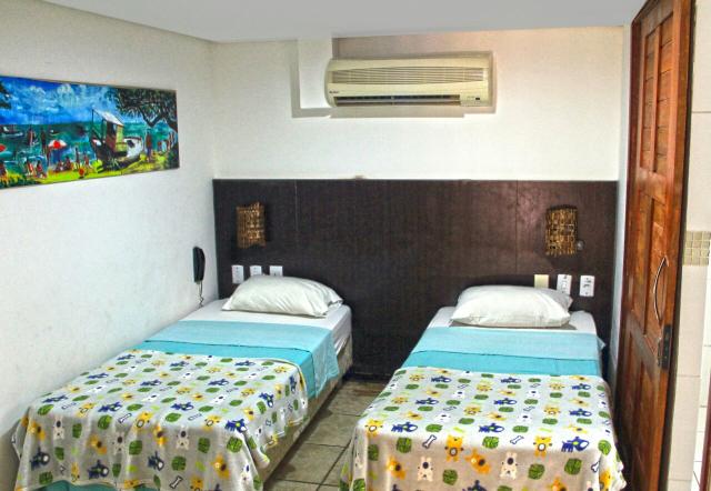 Suite con camas de soltero. Aire acondicionado